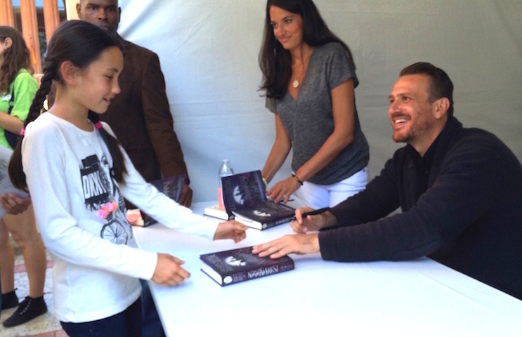 Jason Segel signs a copy of Nightmares for Theresa Laib at L.A.Times Festival of Books (USC)