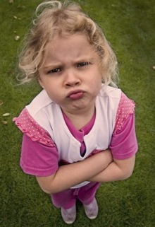 Child showing anger as example of body language